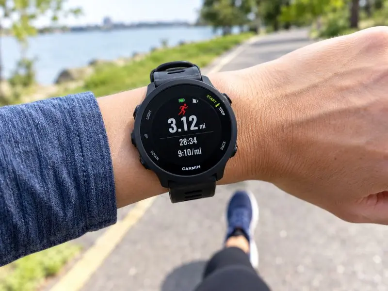 Garmin Forerunner 55 being worn during walking/running.